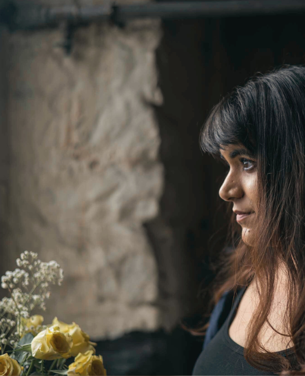 Bridal make up artist Kavita Mistry founder of Bridal Choice in Manchester in a rustic wedding setting